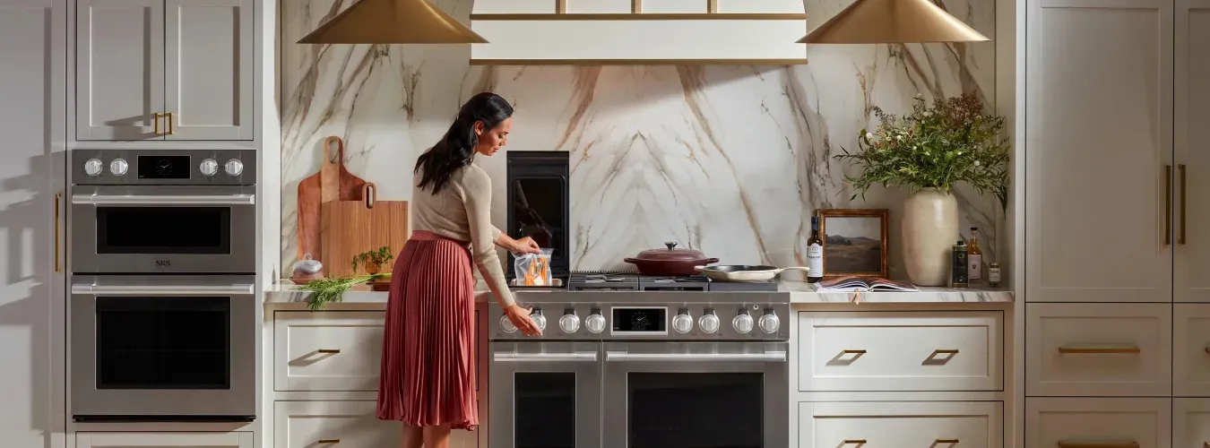 sks-oven-hood-range-woman-cooking